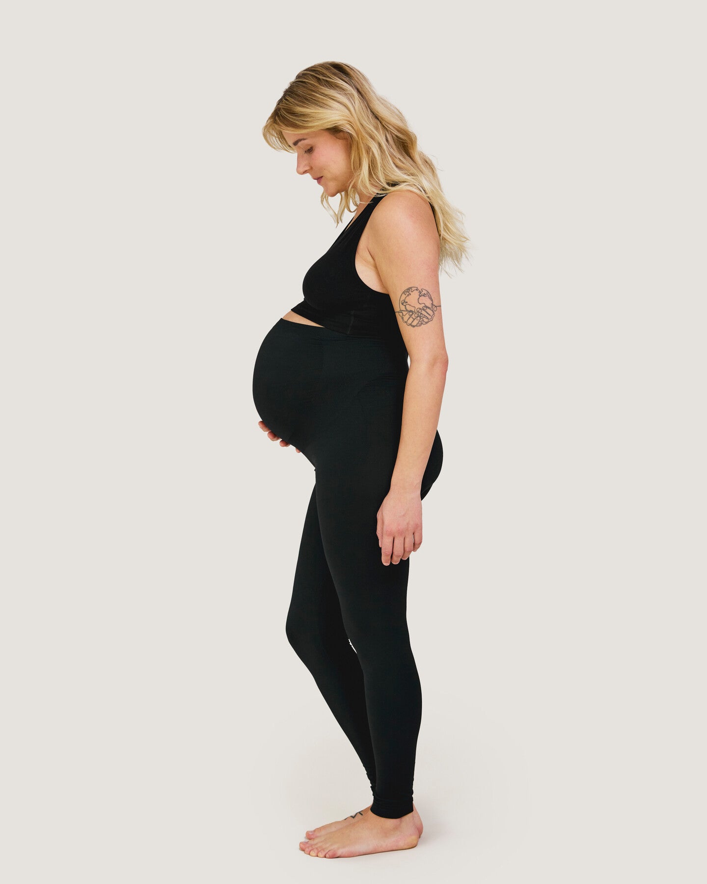 Carriwell stödjande leggings sidovy av gravid kvinna