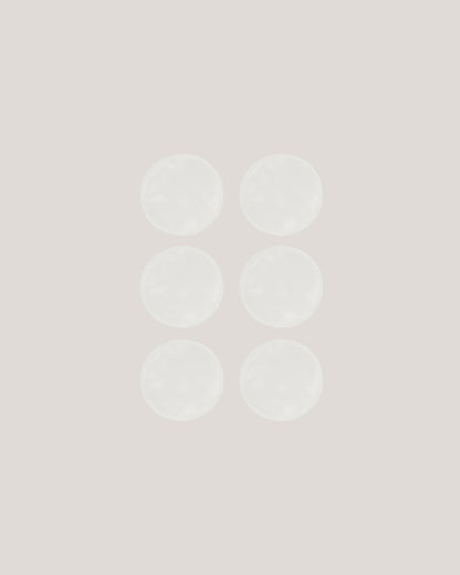 Seks hvide Carriwell ammeindlæg i silke lagt i grid